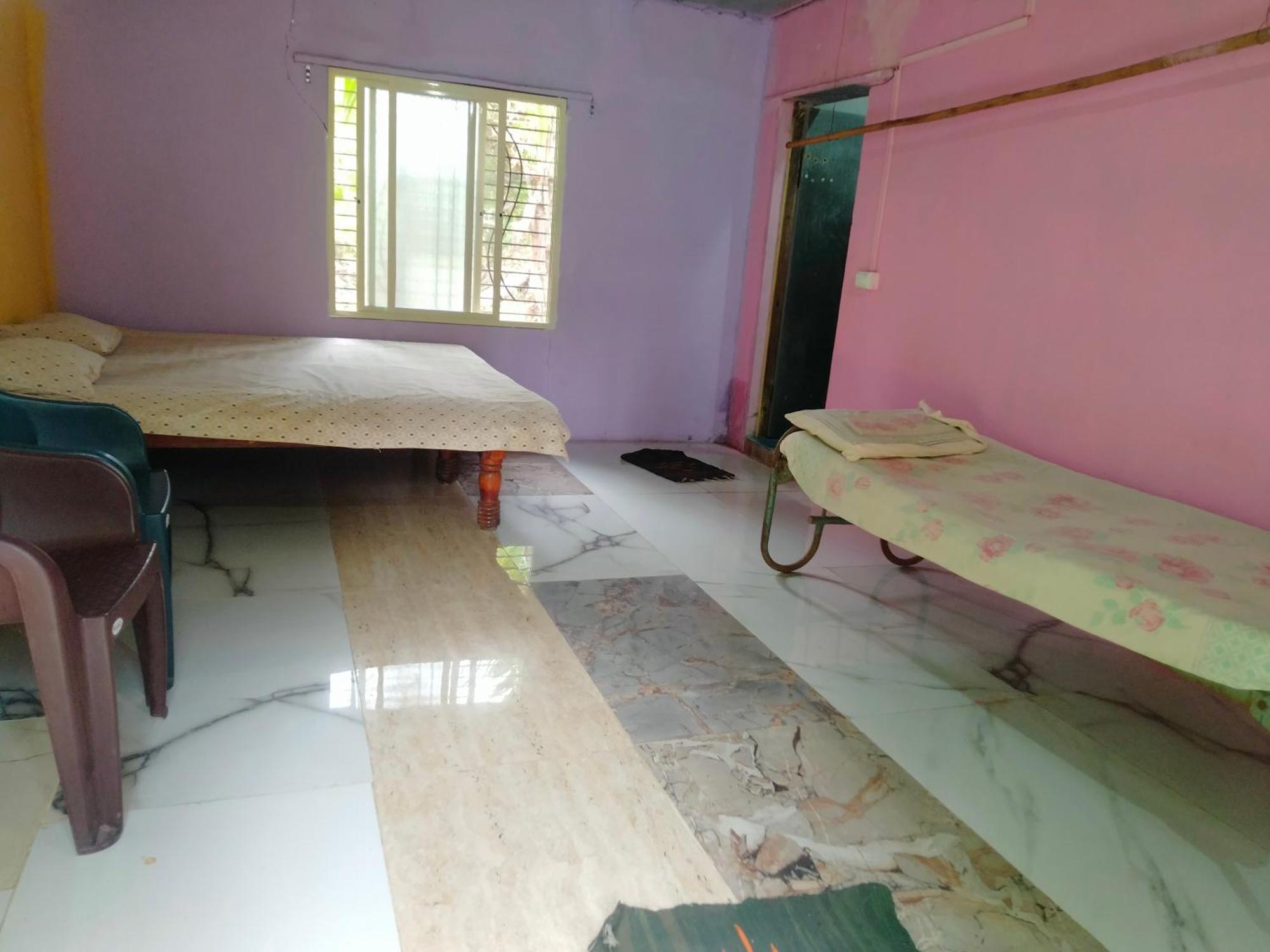 Goldengarden Cottages Hampi Pokoj fotografie