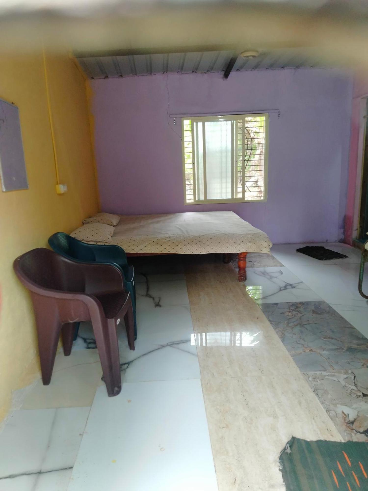 Goldengarden Cottages Hampi Pokoj fotografie